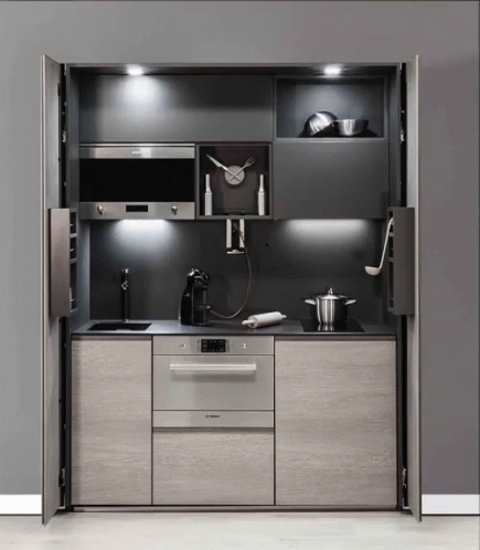 Kitchen With Clock Over Stove and Bosch Appliance