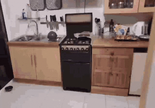 Kitchen With Stove Sink and Dishwasher