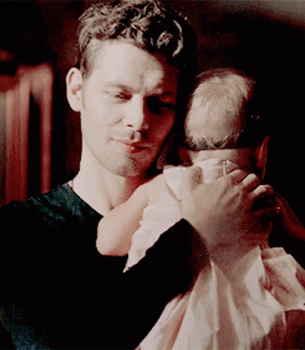 Klaus Mikaelson Holding A Baby GIF