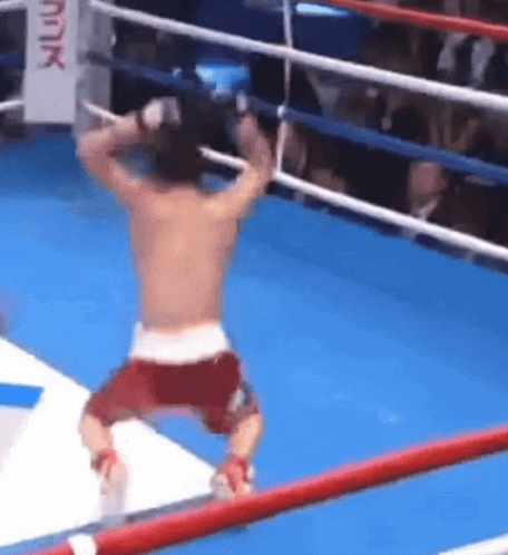 Kneeling Man In Boxing Ring GIF