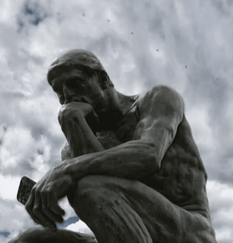 Kneeling Man Statue Hands On Chin GIF