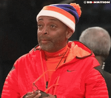 Knicks Fan Spike Lee Checking Score GIF