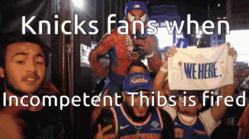 Knicks Fans Holding Incompetent Thibs Fired Poster