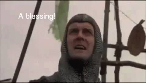 Knight in Helmet Saying Blessing