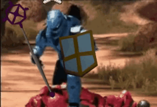Knight With Sword And Shield Standing Over Fallen Knight GIF
