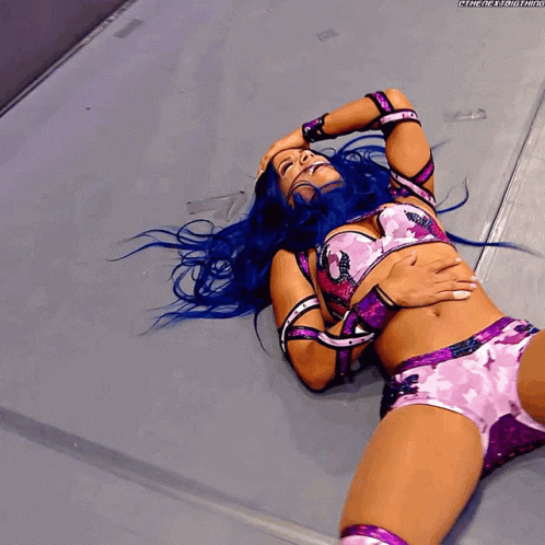 Knockout Sasha Banks Lying In Canvas GIF