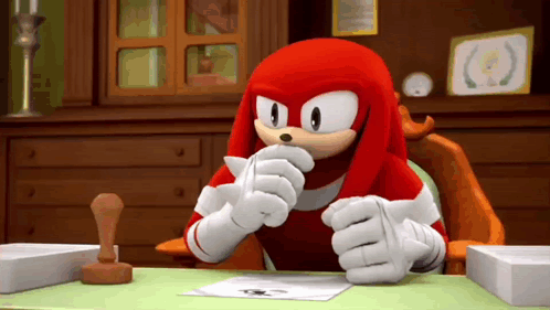 Knuckles The Echidna Sitting At Desk Holding Paper GIF