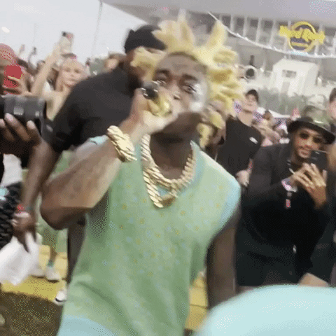 Kodak Black With Gold Hair And Microphone GIF