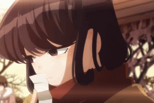 Komi Covering Mouth With Paper GIF