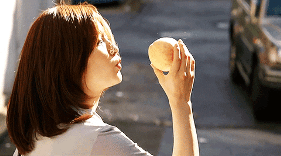 Korean Park So-Dam Adoring Her Peach GIF