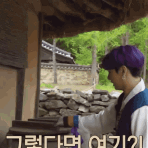 Korean Star In Search Of Something Inside Vases GIF