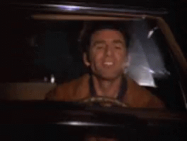 Entertaining Kramer Driving Crazy GIF