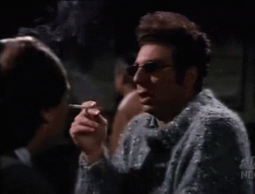 Kramer Smoking Drinking Coughing GIF