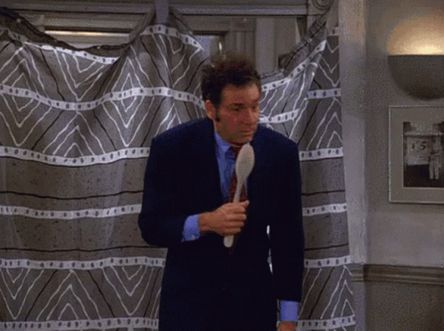 Seinfeld Kramer Grinning Laughing GIF