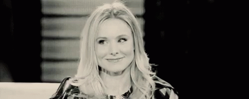 Kristen Bell Black And White Finger On Cheeks GIF