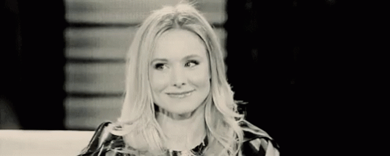 Kristen Bell Black And White Finger On Cheeks GIF
