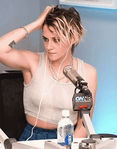 Kristen Stewart Showing Armpit While Seating GIF