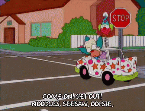 Krusty The Clown Is Driving A Car With A Stop Sign In The Background . GIF