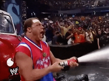 Kurt Angle Hosing Down Opponent Meme GIF