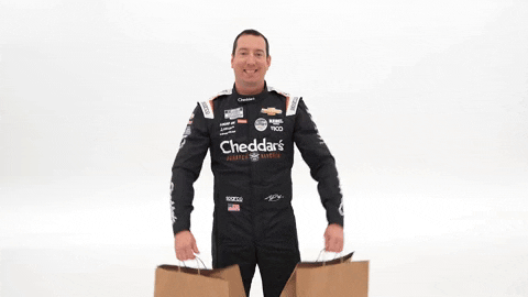 Kyle Busch Lifting Two Shopping Bags GIF