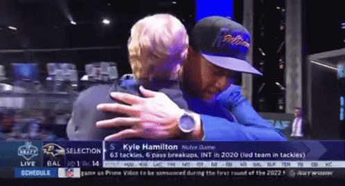 Kyle Hamilton Hugged By Man On TV GIF