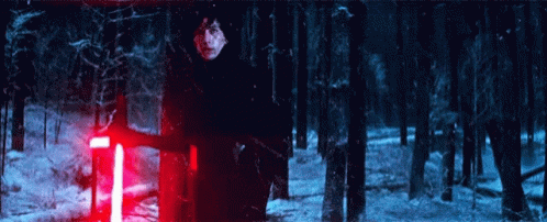 Kylo Ren Holding Red Lightsaber In Snowy Forest GIF