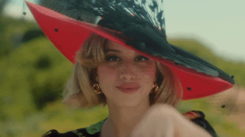 La Zarra Using Polaroid Camera GIF