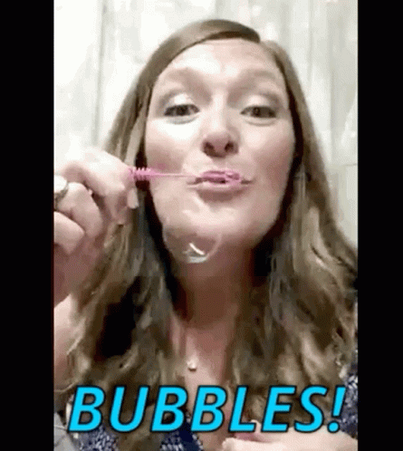 Lady Blowing Bubbles GIF