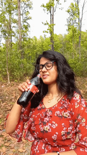 Lady Drinks Coca Cola Slowly GIF