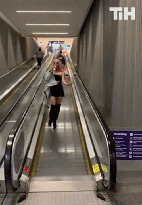Lady Falling Down And Slipped On Elevator GIF
