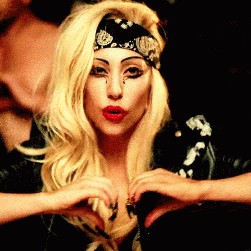 Lady Gaga in Headband Making Heart Shape