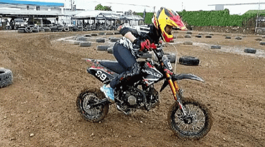 Lady Having Trouble Starting Dirt Bike GIF