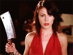 Lady Holds A Butcher Knife GIF