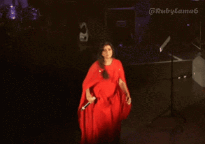 Lady In Red Dress Doing My Pleasure Bow GIF