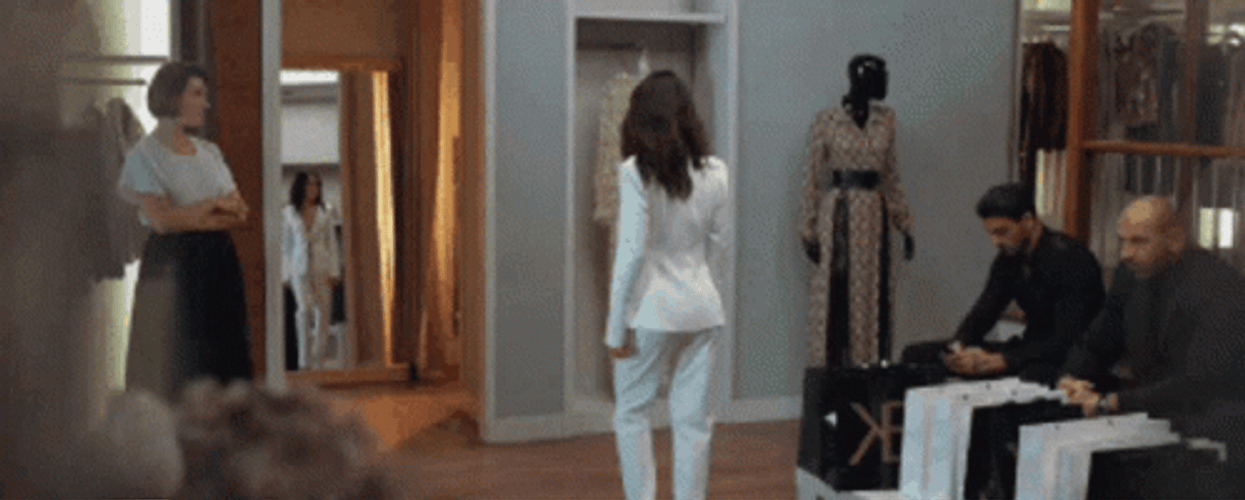 Lady In White Suit Walking Away GIF