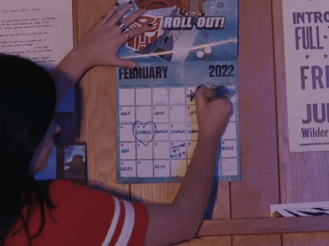 Lady Marking Calendar With X GIF