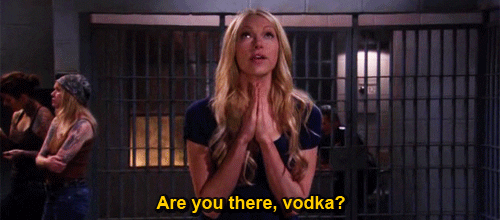 Lady Praying For Two Shots Of Vodka GIF