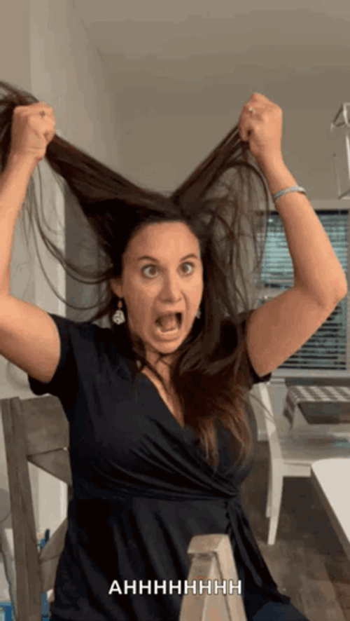Lady Pulling Own Hair Out GIF
