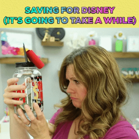 Lady Saving Money For Disney World GIF