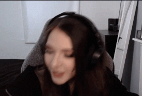 Lady Streamer Revealing Many Uno Reverse Cards GIF