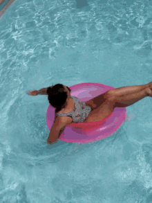 Lady Swimming With Floaters GIF