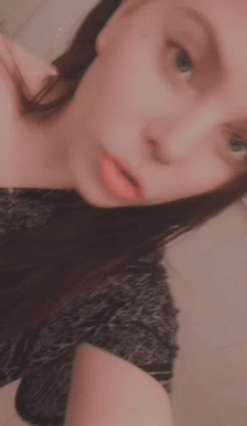 Lady With Tattoo Selfie GIF