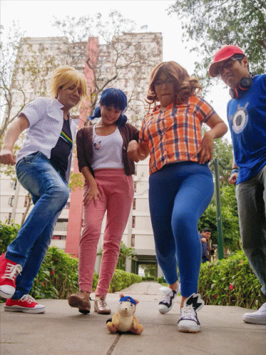 Mischievous Kids Kicking A Ladybug Toy GIF