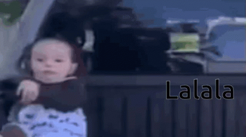 Lalala Reaction Of Baby Girl Sitting Peacefully GIF
