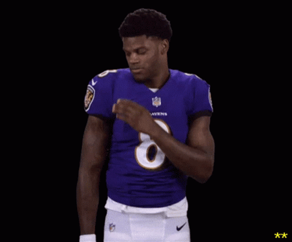 Lamar Jackson Brushing Off Shoulders GIF
