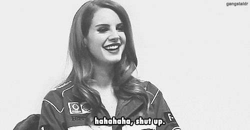 Lana Del Ray Laughing Shut Up Baby I Know It GIF