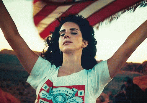 Lana Del Rey Hands Up In The Air GIF