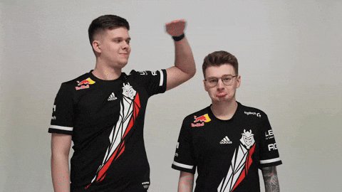 Lanky Man Comparing Heights GIF