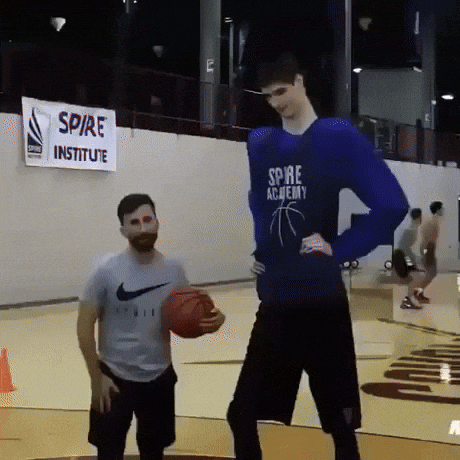 Lanky Man Shoots Ball Easily GIF