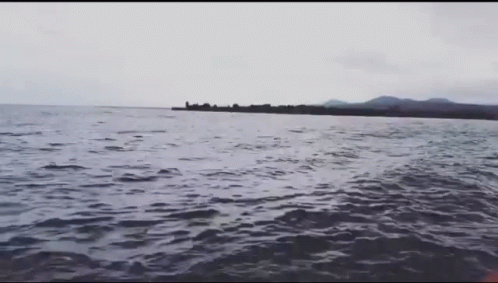 Large Body of Water With Small Island